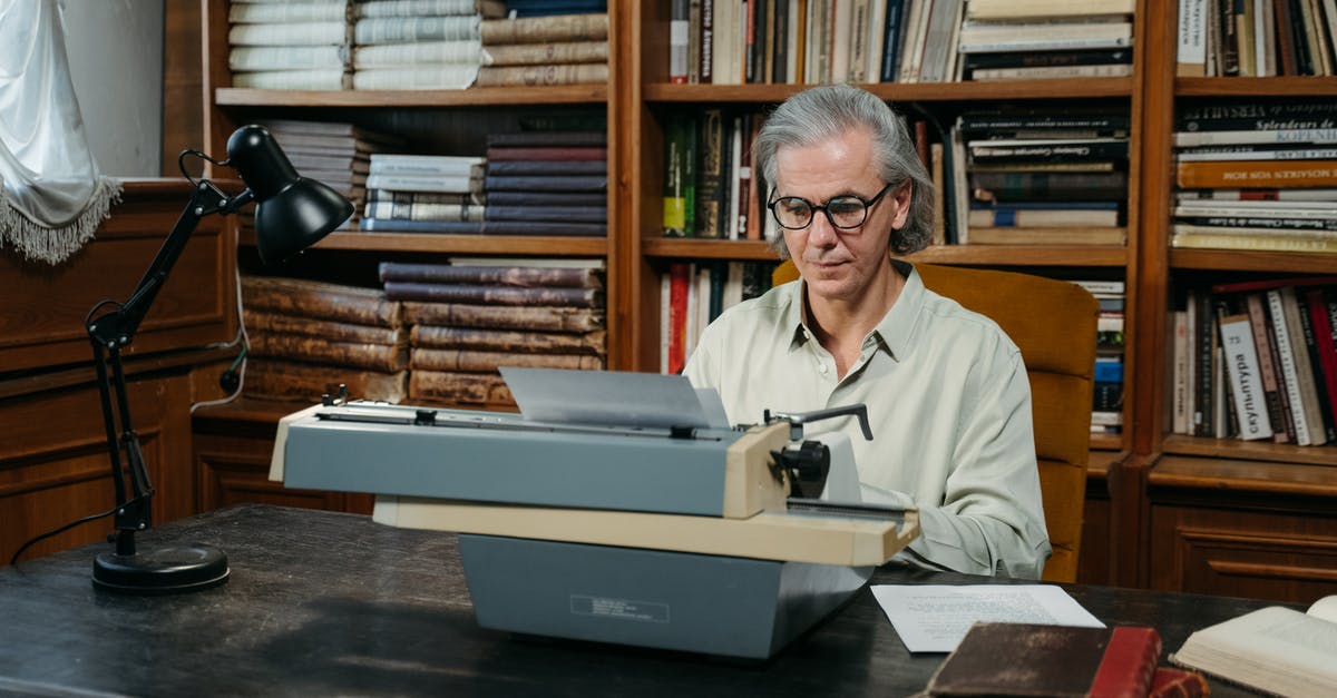 Employment and Education Documents with IM5252e - An Elderly Man Typing on a Vintage Typewriter Employment and Education Documents with IM5252e - An Elderly Man Typing on a Vintage Typewriter