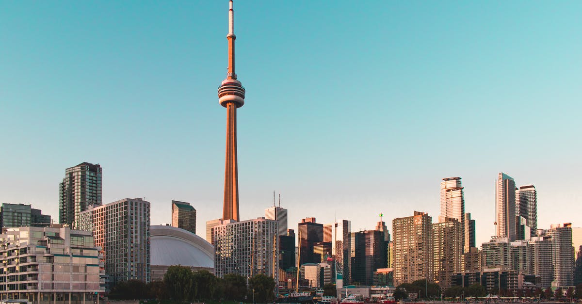 Enter Canada with 20 days left on Vistor visa - High Rise Buildings Under Blue Sky Enter Canada with 20 days left on Vistor visa - High Rise Buildings Under Blue Sky