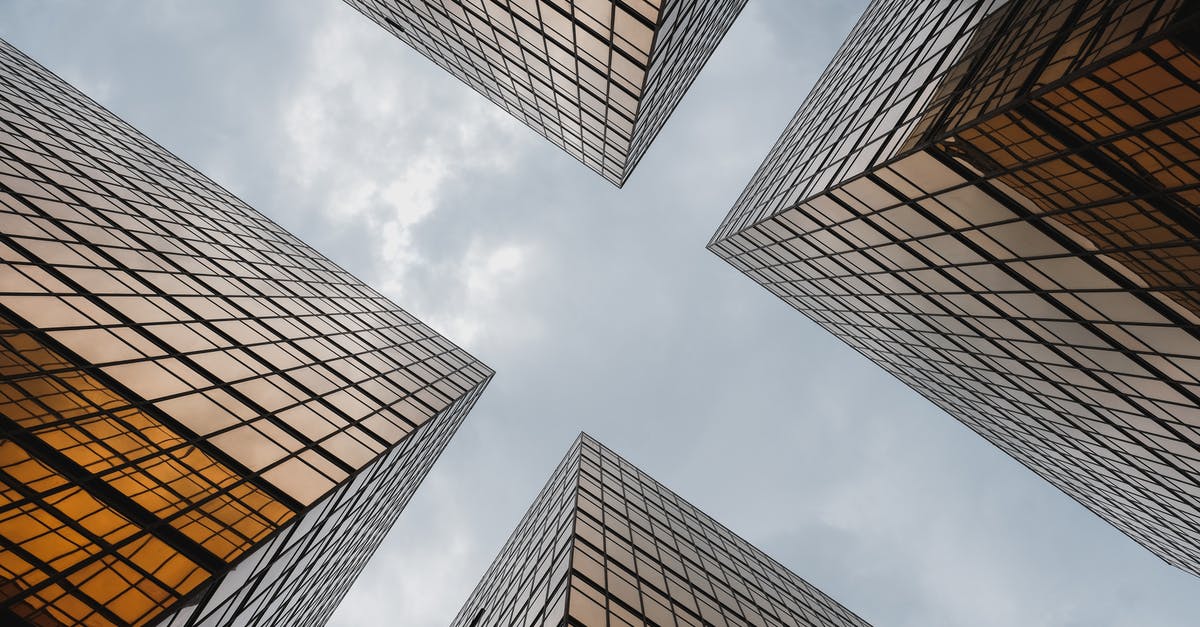 Enter China (from European Union), after being fined in Hong Kong a few years ago - Worms Eye View of High Rise Modern Buildings Enter China (from European Union), after being fined in Hong Kong a few years ago - Worms Eye View of High Rise Modern Buildings
