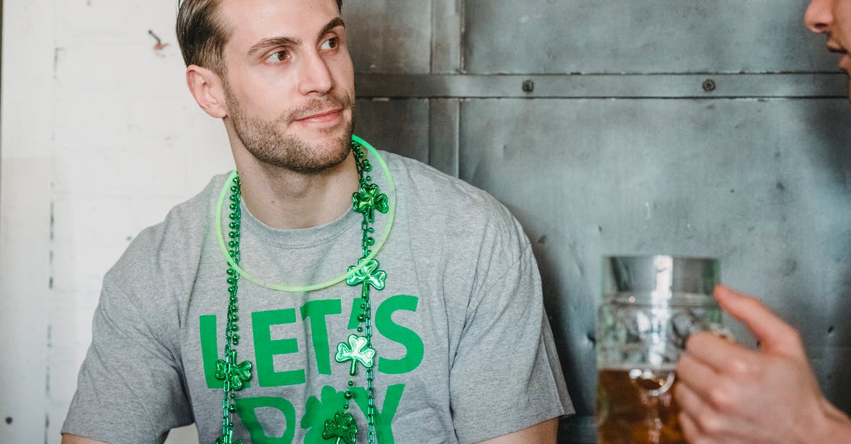 Enter Ireland as non-visa national and proceed to UK - what is the allowed duration of stay? - Positive bearded male wearing neon green glow stick necklace and necklace with shamrock and gray t shirt devoted to St Patrick Day communicating with friend in pub while celebrating feast Enter Ireland as non-visa national and proceed to UK - what is the allowed duration of stay? - Positive bearded male wearing neon green glow stick necklace and necklace with shamrock and gray t shirt devoted to St Patrick Day communicating with friend in pub while celebrating feast