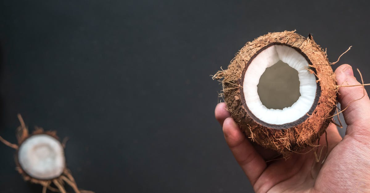 Enter the Schengen Space if I hold an onward ticket - Person Holding Opened Coconut Enter the Schengen Space if I hold an onward ticket - Person Holding Opened Coconut