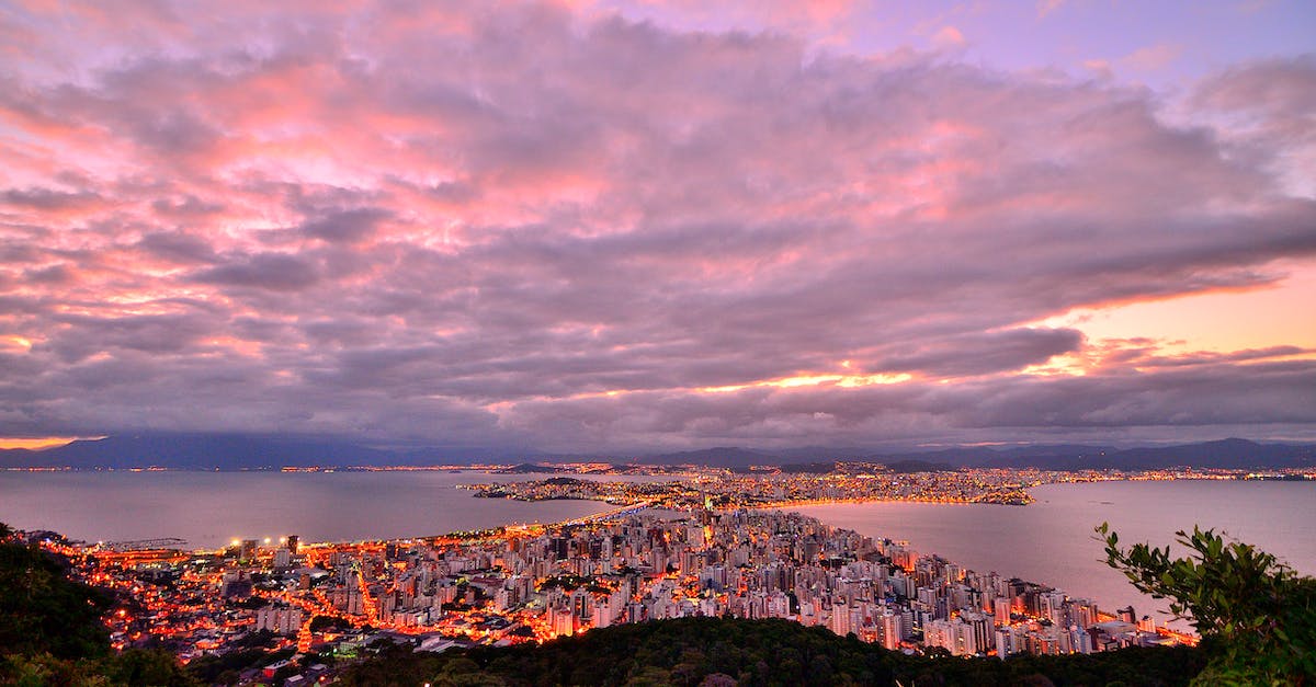Entering Brazil by air, leaving by land, will I be denied entry? - Photo of City Buildings Taken Up on the Mountain during Dusk Entering Brazil by air, leaving by land, will I be denied entry? - Photo of City Buildings Taken Up on the Mountain during Dusk