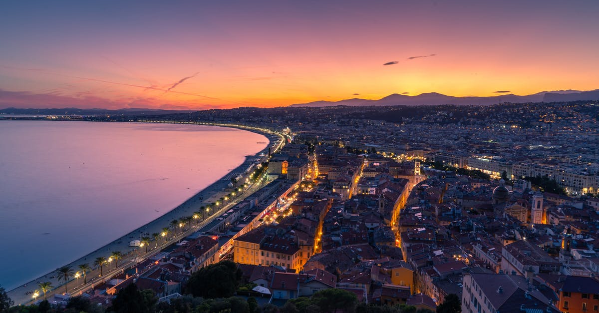 Entering France on German issued Schengen Visa (South African passport) [duplicate] - Cityscape and Body of Water during Sunset