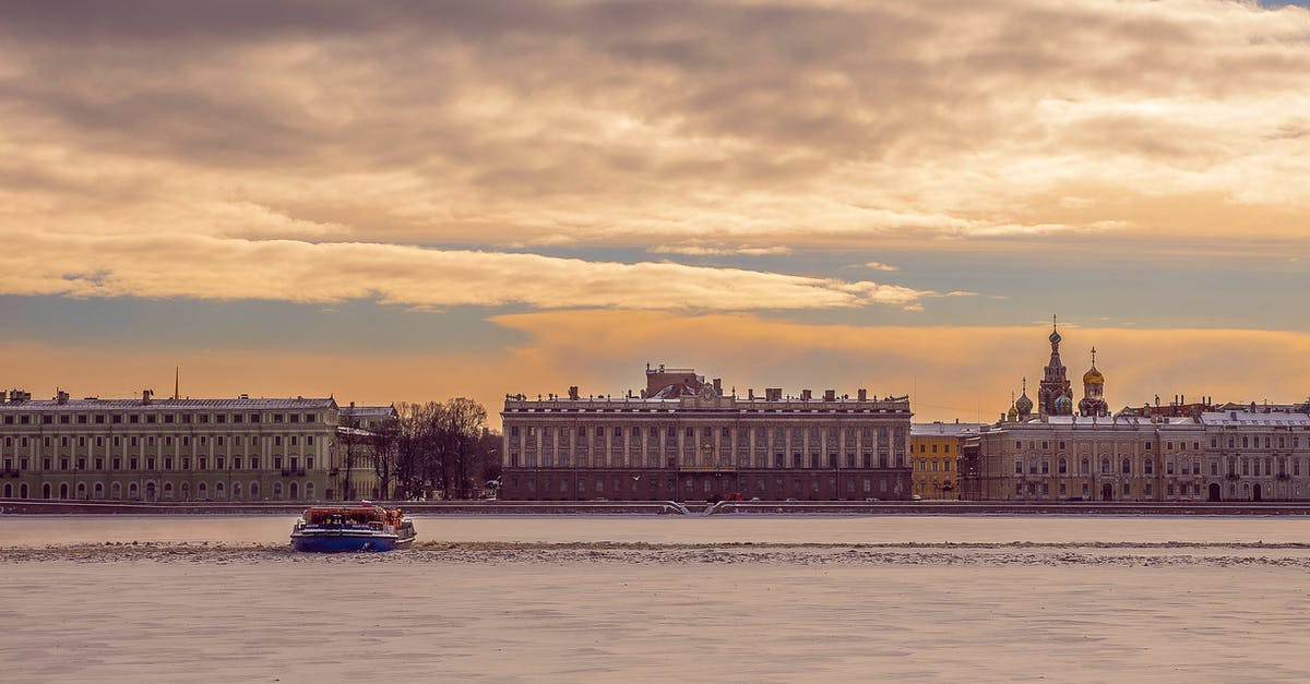 Entering Russia on visa-exempt St Petersburg ferry: can I leave the city? - Gray Concrete Building Beside Body of Water