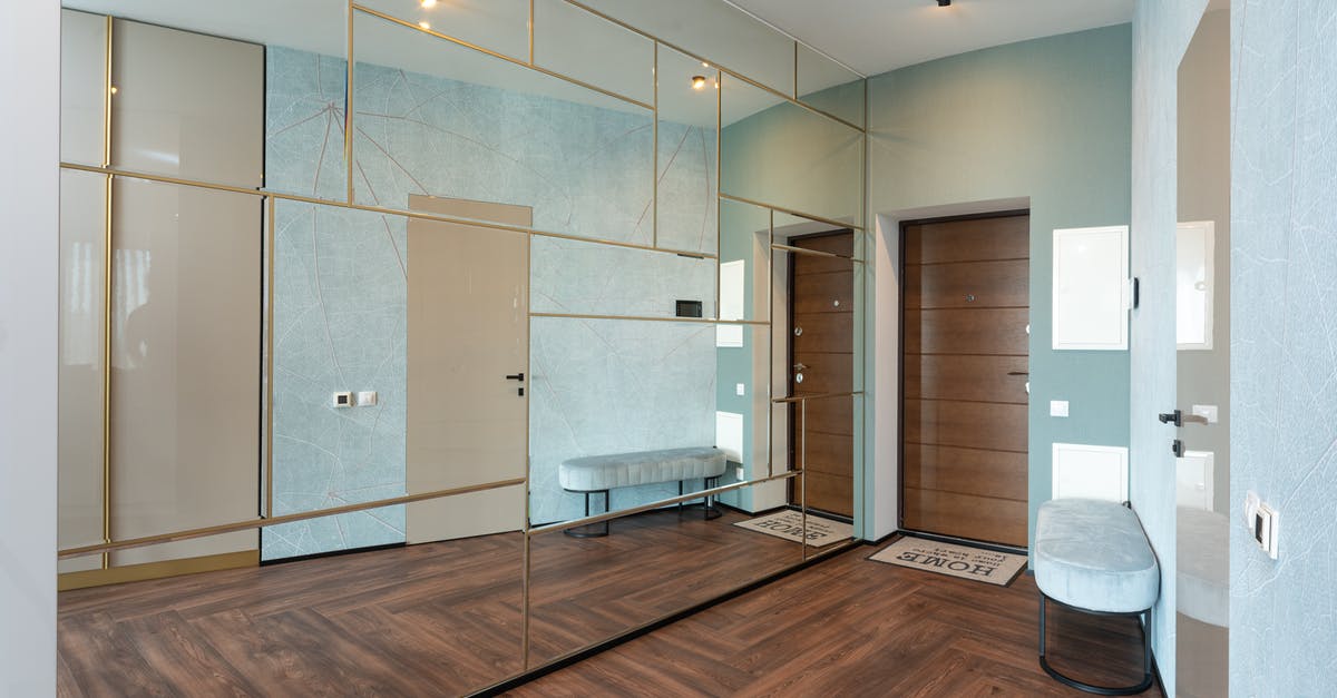 Entry and exit stamps in Schengen-UK-Schengen - Interior of corridor with mirror wardrobe Entry and exit stamps in Schengen-UK-Schengen - Interior of corridor with mirror wardrobe
