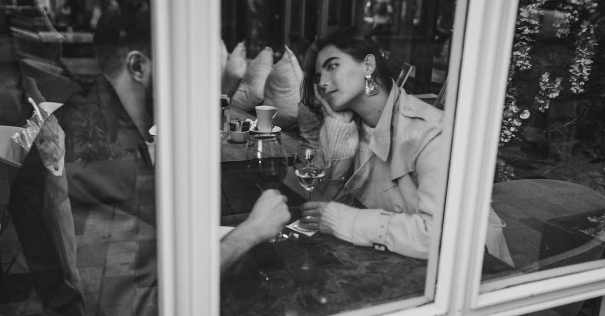 Entry stamp of Ireland - is "until" date inclusive? - Grayscale Photo of Woman in Jacket Sitting Beside Glass Window Entry stamp of Ireland - is "until" date inclusive? - Grayscale Photo of Woman in Jacket Sitting Beside Glass Window
