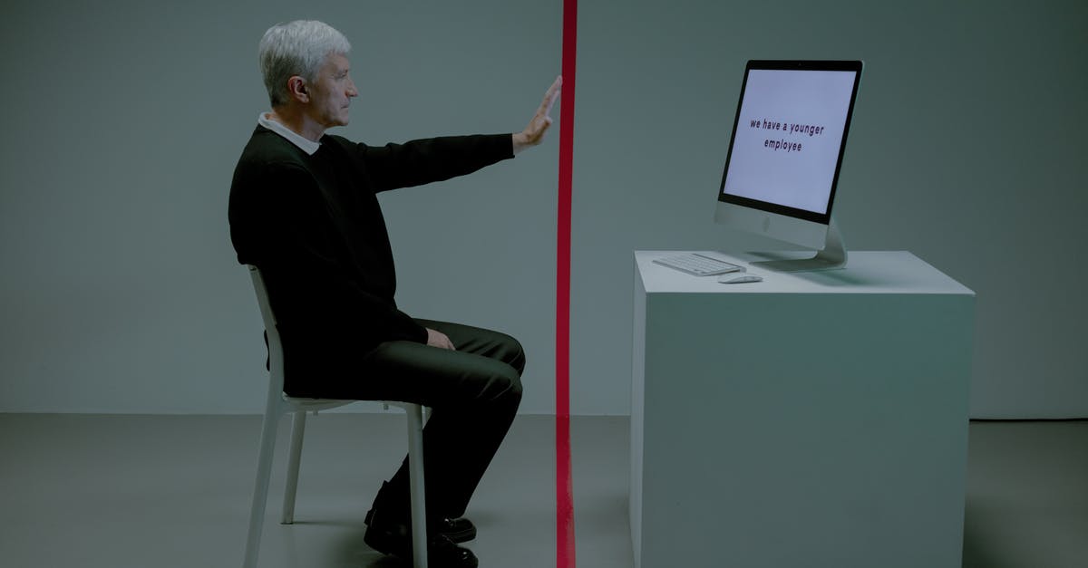 ESTA rejection after B-2 rejection? - Senior adult man sitting before computer separated from him by red line ESTA rejection after B-2 rejection? - Senior adult man sitting before computer separated from him by red line