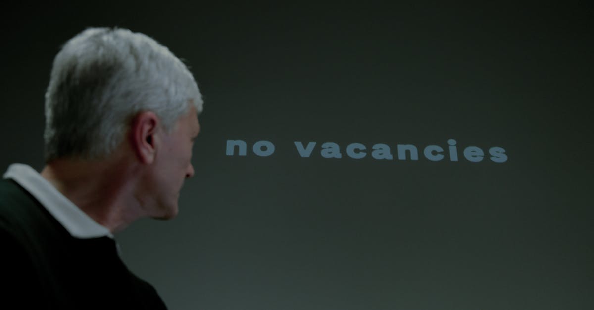 ESTA rejection after B-2 rejection? - Senior man looking at inscription displayed on wall saying no vacancies ESTA rejection after B-2 rejection? - Senior man looking at inscription displayed on wall saying no vacancies