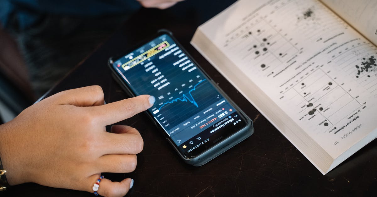 E-Ticket vs Itinerary vs Booking Reference - Person Studying And Making A Research On Smartphone E-Ticket vs Itinerary vs Booking Reference - Person Studying And Making A Research On Smartphone