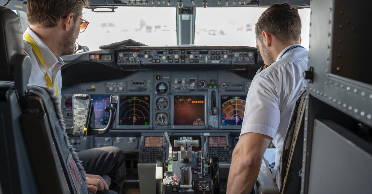 Eu 261 query on multi flight ticket during BA pilots strike - Two Pilots Sitting Inside Plane Eu 261 query on multi flight ticket during BA pilots strike - Two Pilots Sitting Inside Plane