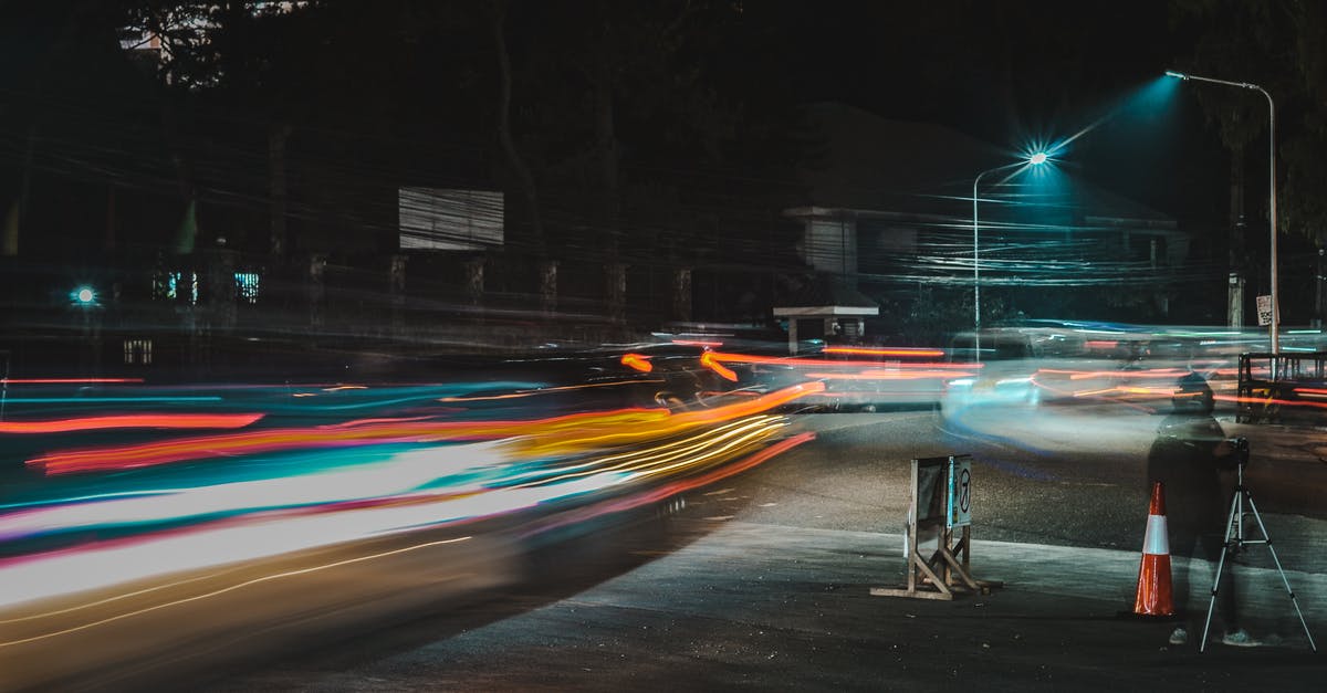 Europe: differences between colours of highway road-signs - Time Lapse Photography of Cars on Road during Night Time Europe: differences between colours of highway road-signs - Time Lapse Photography of Cars on Road during Night Time