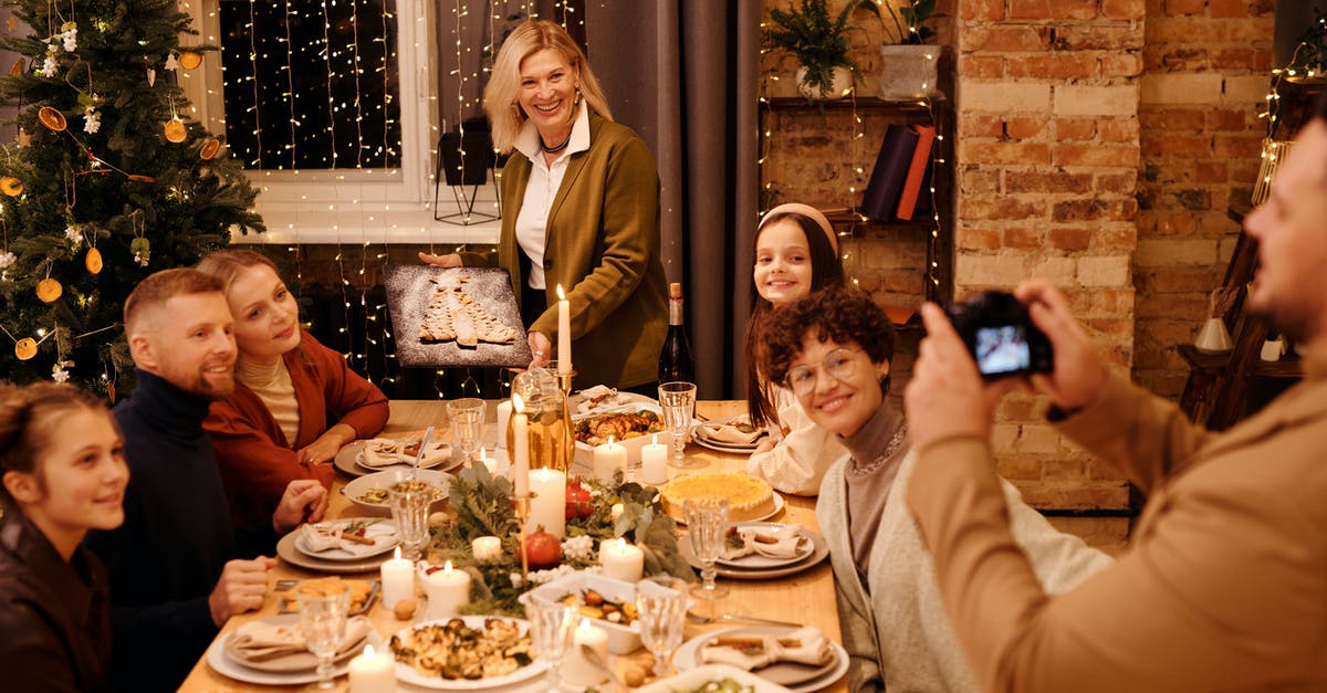 Evening landing (or take-off) pictured on photo - Family Celebrating Christmas Dinner Evening landing (or take-off) pictured on photo - Family Celebrating Christmas Dinner