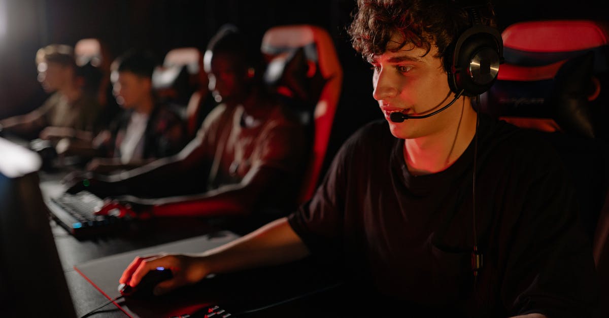 e-Visa for Kaliningrad, TWOV at SVO possible? - A Man Looking Serious in Playing a Video Game e-Visa for Kaliningrad, TWOV at SVO possible? - A Man Looking Serious in Playing a Video Game