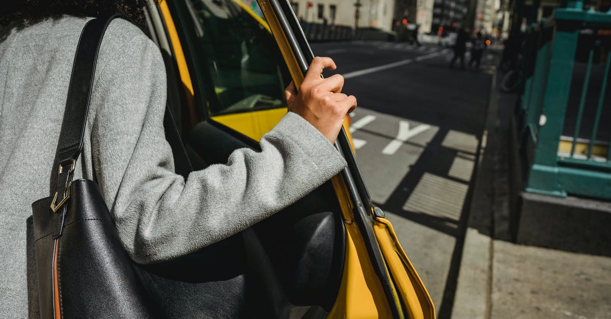 Except Algonquin Park, which provincial parks in Ontario are penetrated by roads open to the public? - Crop ethnic woman opening door of taxi Except Algonquin Park, which provincial parks in Ontario are penetrated by roads open to the public? - Crop ethnic woman opening door of taxi