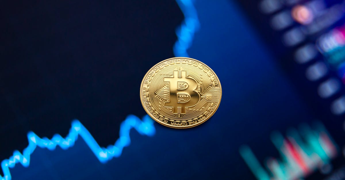 Exchange rate for the Tourist Card in Iran - Gold bitcoin coin on background of growth chart Exchange rate for the Tourist Card in Iran - Gold bitcoin coin on background of growth chart