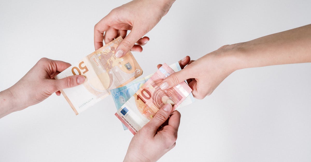 Exchanging Euro to CZK in Prague - Person Holding 10 Euro Bill Exchanging Euro to CZK in Prague - Person Holding 10 Euro Bill