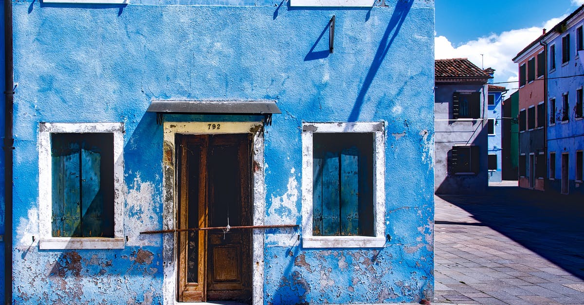 Exit Tax When Exiting Panama by Foot? - Blue Concrete 2-storey House Exit Tax When Exiting Panama by Foot? - Blue Concrete 2-storey House