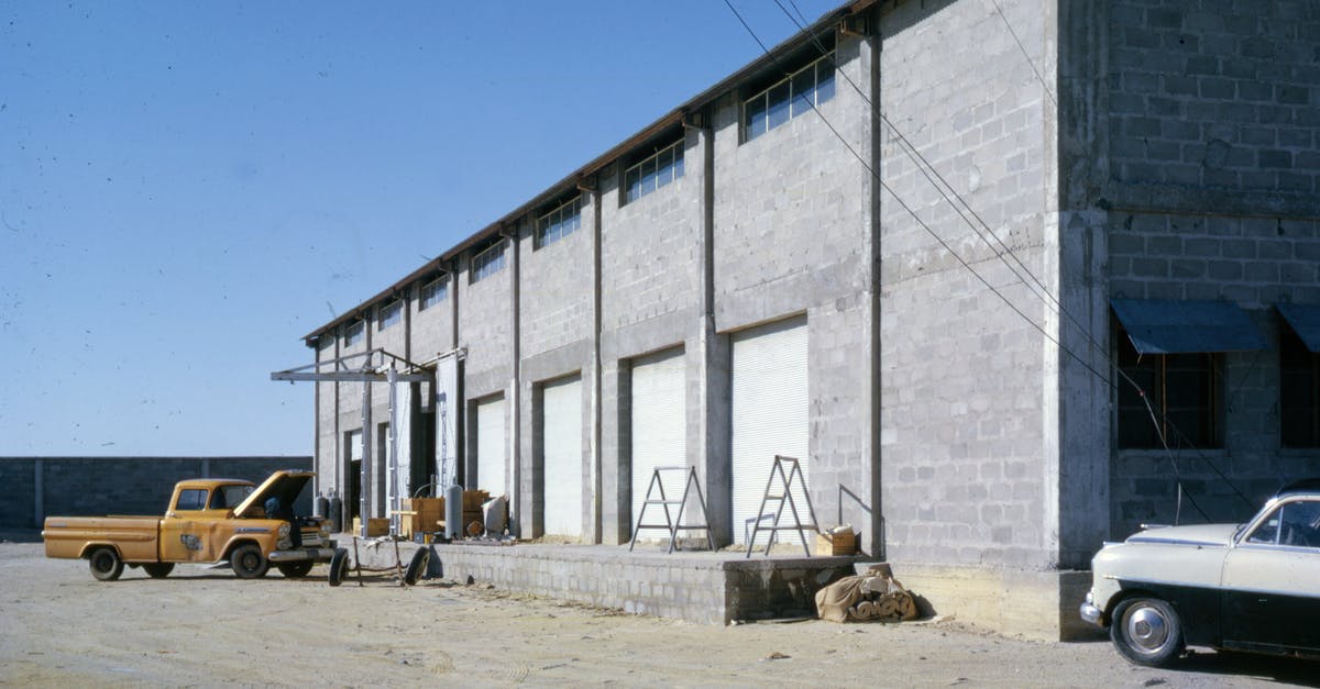 Exit-Reentry for Saudi Arabia [closed] - Old Photo of Gray  Concrete Building