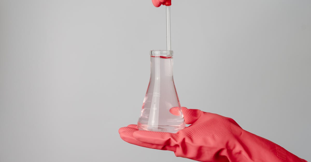 Expanding items? - Person Holding Pink and Clear Glass Bottle Expanding items? - Person Holding Pink and Clear Glass Bottle