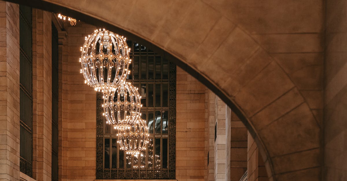 Expired visa, can I still fly inside the US without risk? - Majestic glossy lamps hanging on high ceiling in hallway Expired visa, can I still fly inside the US without risk? - Majestic glossy lamps hanging on high ceiling in hallway