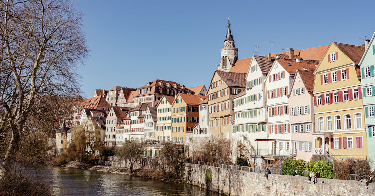 Extended stay visa for Germany - White and Brown Concrete Building Beside River Extended stay visa for Germany - White and Brown Concrete Building Beside River