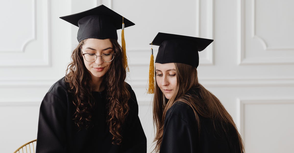 F1 visa after graduation - Woman in Academic Dress and Academic Hat F1 visa after graduation - Woman in Academic Dress and Academic Hat
