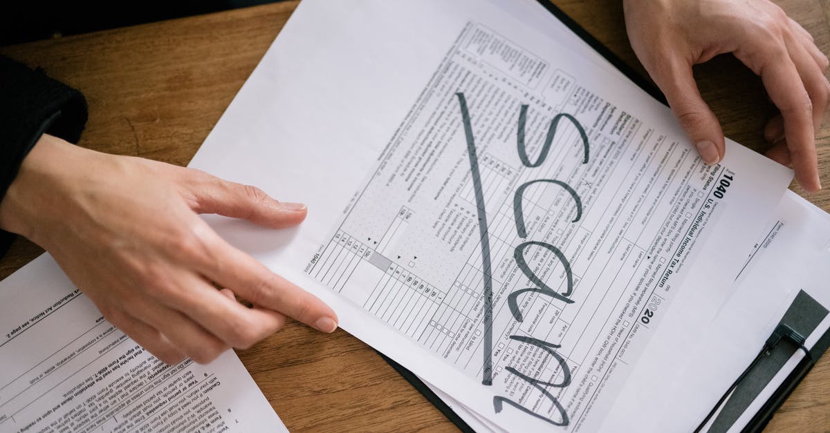 Fake work permit and deportation - A Tax Form with a Word Scam on its Face Fake work permit and deportation - A Tax Form with a Word Scam on its Face