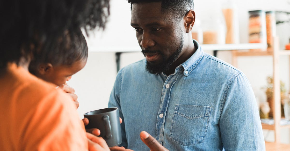Family DS-160 is required separately - Man in Blue Denim Button Up Jacket Holding Black Ceramic Mug Family DS-160 is required separately - Man in Blue Denim Button Up Jacket Holding Black Ceramic Mug