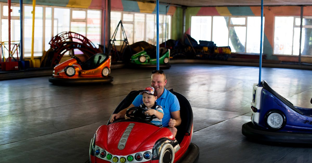 Family with kids driving from Marrakesh to Fez - any threat of danger for daytime driving? - Man and Boy Riding Bumper Car
