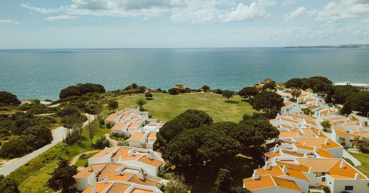 Ferries from Iceland to Portugal or Spain - Houses with Yellow Roofs at Faro District Ferries from Iceland to Portugal or Spain - Houses with Yellow Roofs at Faro District