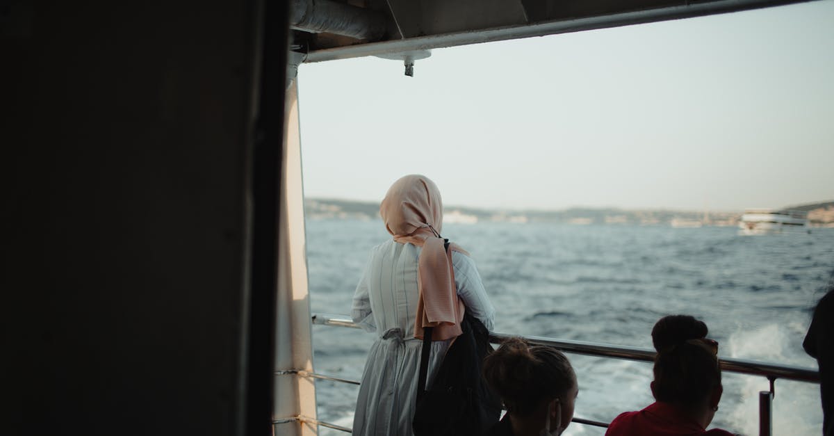 Ferry from Phuket to Koh Lipe - Woman in White Hijab Sitting on Boat Ferry from Phuket to Koh Lipe - Woman in White Hijab Sitting on Boat