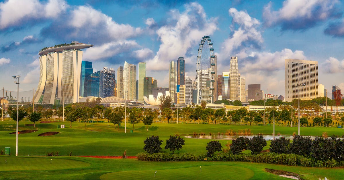 Ferry services between Singapore and Borneo - High Rise Building Near Park Ferry services between Singapore and Borneo - High Rise Building Near Park