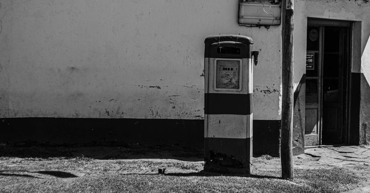 Filling stations and petrol stations in Nigeria, is there any difference? - Old gas station on rough walkway on street Filling stations and petrol stations in Nigeria, is there any difference? - Old gas station on rough walkway on street
