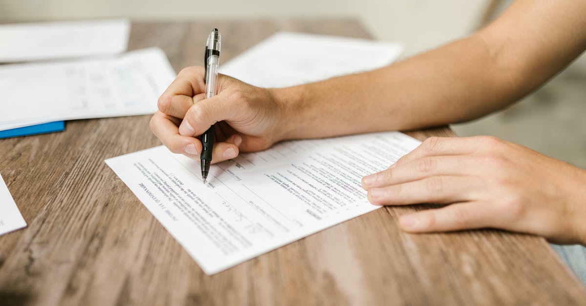 Filling up the VIDEX Form (Schengen Visa) Regarding Address - Close-Up Shot of a Person Filling Out a Form Filling up the VIDEX Form (Schengen Visa) Regarding Address - Close-Up Shot of a Person Filling Out a Form