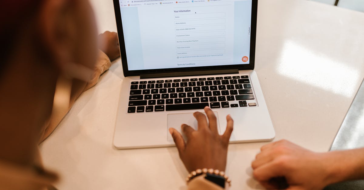 Filling up the VIDEX Form (Schengen Visa) Regarding Address - Close-Up Shot of a Person Filling out a Form Using a Laptop Filling up the VIDEX Form (Schengen Visa) Regarding Address - Close-Up Shot of a Person Filling out a Form Using a Laptop