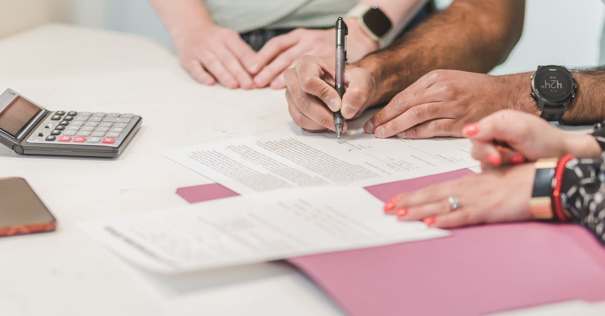 Filling up the VIDEX Form (Schengen Visa) Regarding Address - A Person Wearing Wristwatch Filling Up the Paper Filling up the VIDEX Form (Schengen Visa) Regarding Address - A Person Wearing Wristwatch Filling Up the Paper