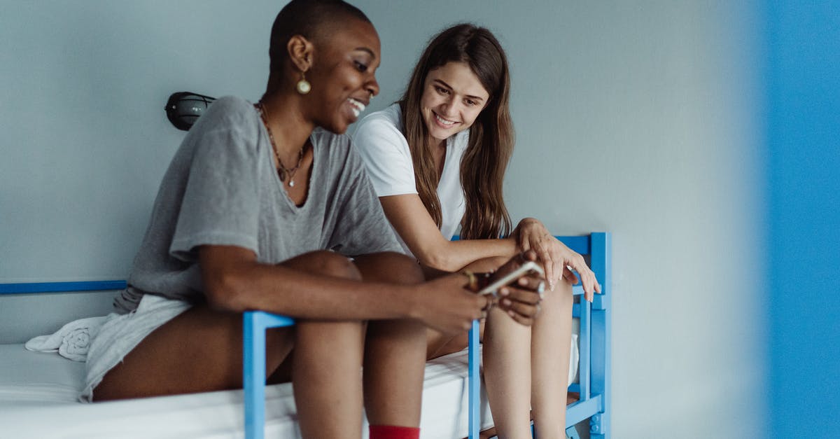 Finding a last minute hostel in Ko Phi Phi Don (some Hostels don't have websites) - Women Sitting on a Hostel Bunk Bed Finding a last minute hostel in Ko Phi Phi Don (some Hostels don't have websites) - Women Sitting on a Hostel Bunk Bed