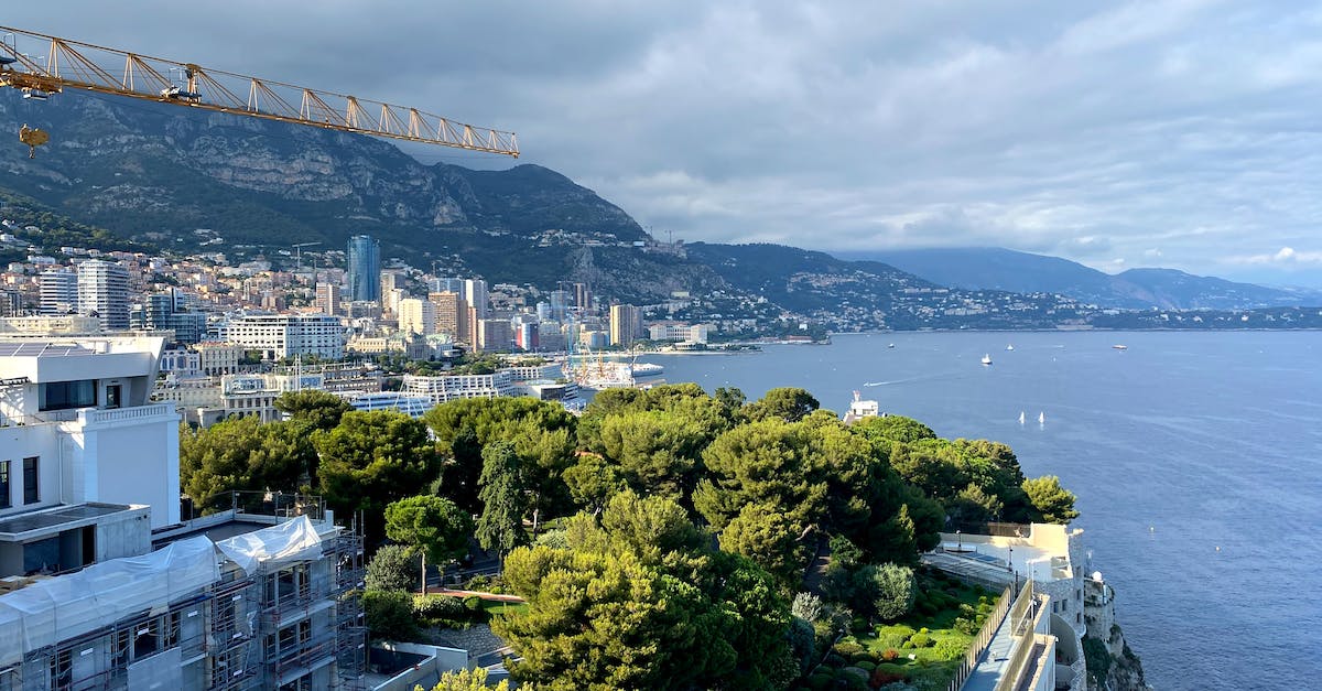 Finding a notary in France / Italy - Aerial View of City Buildings Near Sea Finding a notary in France / Italy - Aerial View of City Buildings Near Sea