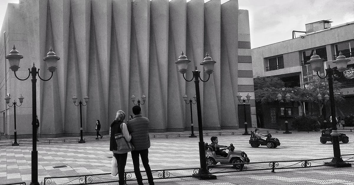 Finding a place to stay in Cancun (or anywhere really) as a single male - Grayscale Photo of Woman Walking on Sidewalk Finding a place to stay in Cancun (or anywhere really) as a single male - Grayscale Photo of Woman Walking on Sidewalk