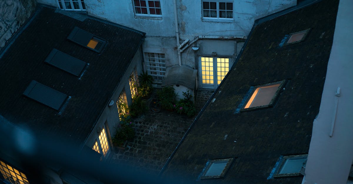 Finding a quiet place to meet in San Francisco (or any city)? - Small backyard with lit windows in twilight viewed from balcony Finding a quiet place to meet in San Francisco (or any city)? - Small backyard with lit windows in twilight viewed from balcony