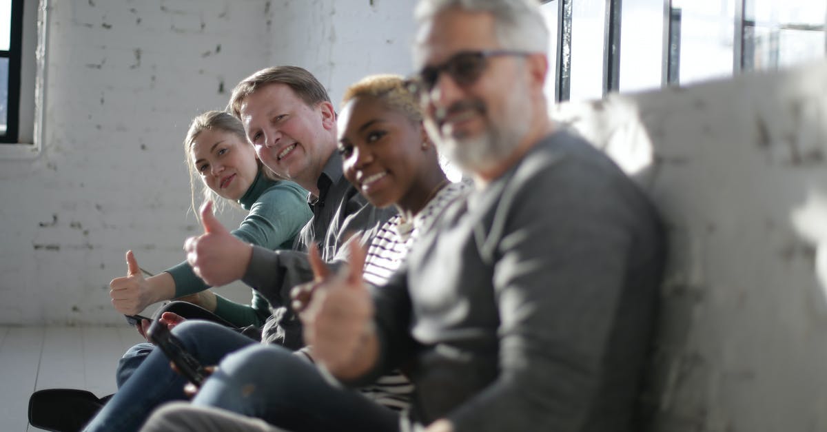 Finding good Escape Rooms in Budapest? - Cheerful diverse friends demonstrating thumb up gesture Finding good Escape Rooms in Budapest? - Cheerful diverse friends demonstrating thumb up gesture
