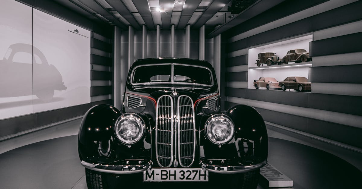 Finding travelers to Germany from Hungary by car - Selective Focus Photography of Black Car Finding travelers to Germany from Hungary by car - Selective Focus Photography of Black Car