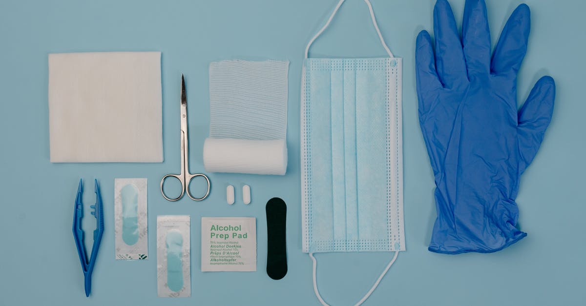 First aid scissors confiscated by Dubai airport security - A Set of First Aid Kit Tools on Blue Surface First aid scissors confiscated by Dubai airport security - A Set of First Aid Kit Tools on Blue Surface
