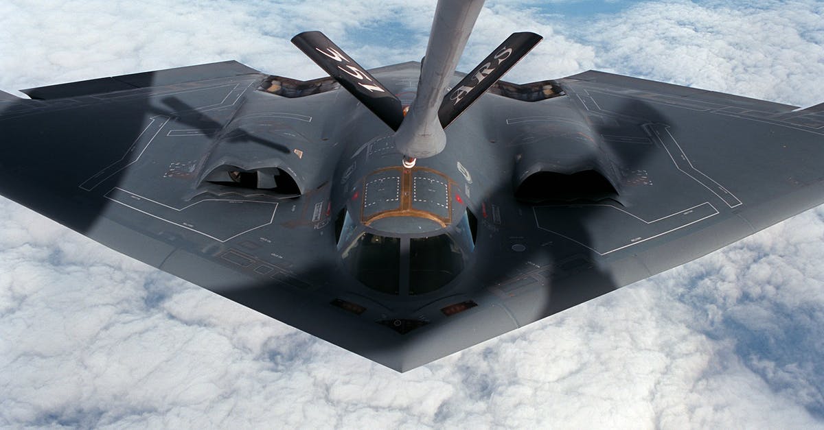 Flight Crew Timed Out after Diversion in USA - entitled to voucher? - Gray Fighter Drone Above White Clouds Flight Crew Timed Out after Diversion in USA - entitled to voucher? - Gray Fighter Drone Above White Clouds