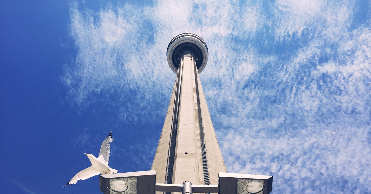 Flight DC → Toronto → Vancouver → Sydney. Have to take out luggage at Vancouver? - High-angle Photography of Gray Tower Flight DC → Toronto → Vancouver → Sydney. Have to take out luggage at Vancouver? - High-angle Photography of Gray Tower