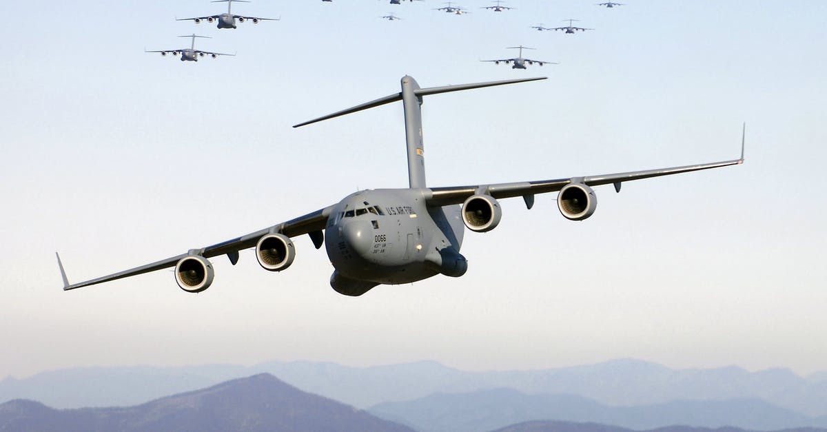 Flight to the US: replacement Li-Ion battery - Grey Cargo Plane Flying Flight to the US: replacement Li-Ion battery - Grey Cargo Plane Flying