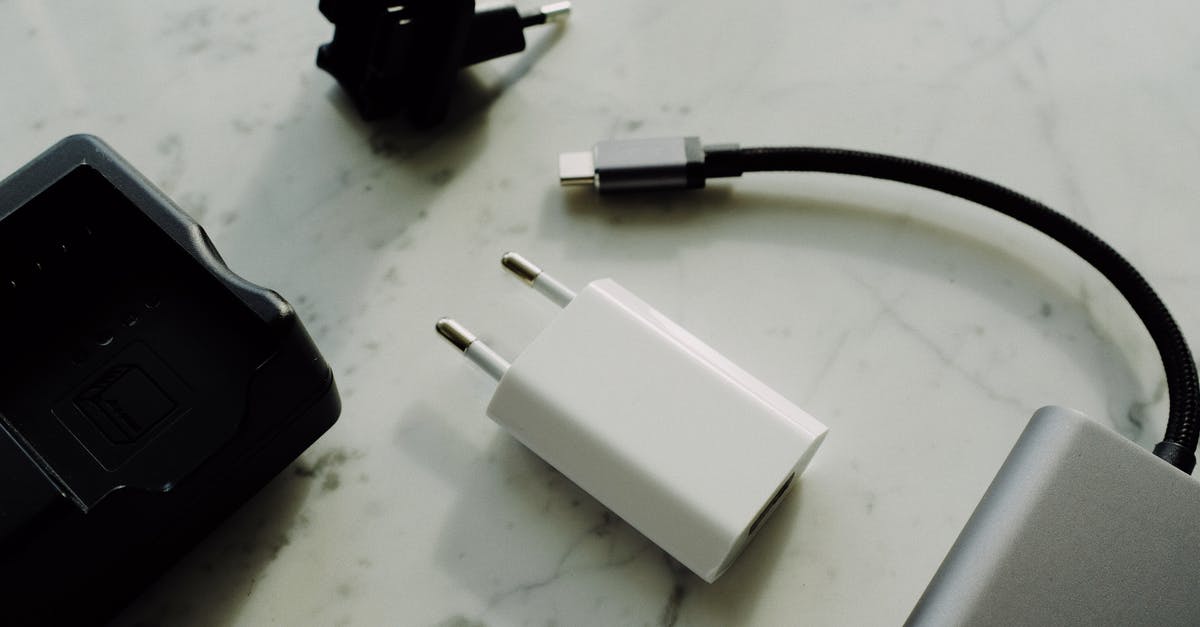Flights booked and tickets issued but no charge on my bank account? - Composition of various modern electronic devices placed on white marble surface Flights booked and tickets issued but no charge on my bank account? - Composition of various modern electronic devices placed on white marble surface