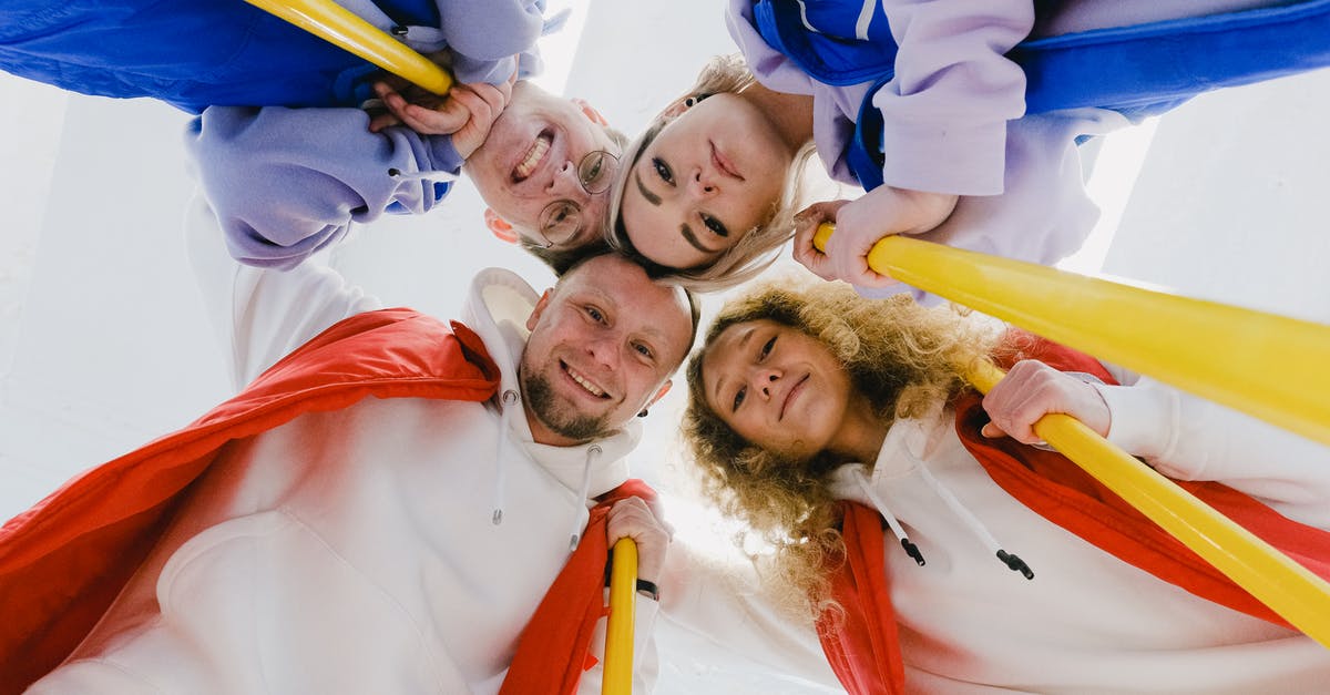 Flying company delayed luggages on professional mission [closed] - Glad sportsmen in group embrace during curling game