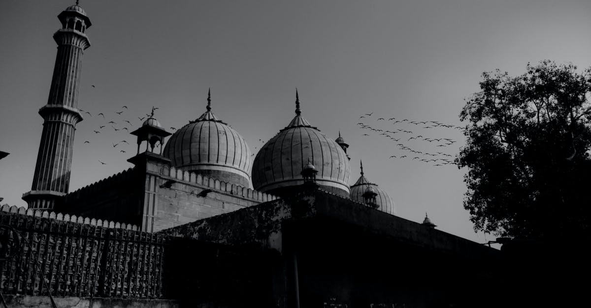 Flying from KL, Malaysia to Lucknow, India with layover in Singapore [duplicate] - Grayscale Photo of Mosque
