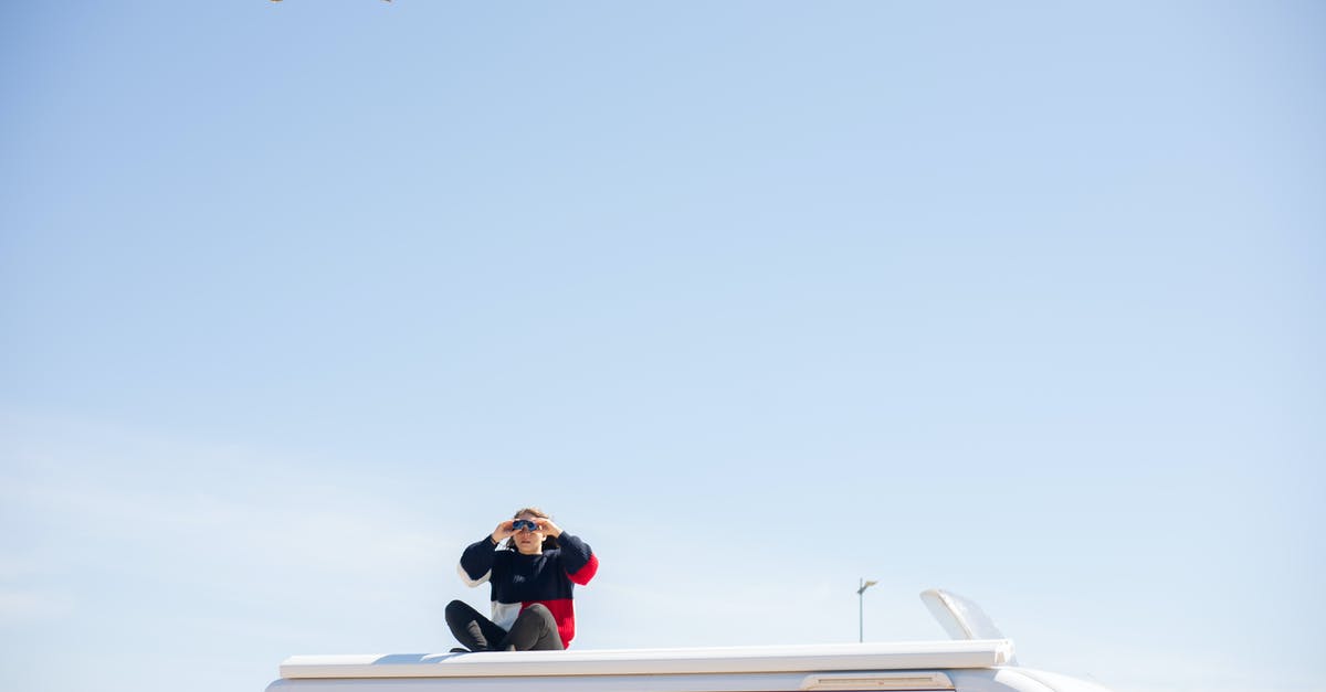 Flying on Southwest with a cat - Man in Black Jacket and Black Pants Sitting on White Boat Flying on Southwest with a cat - Man in Black Jacket and Black Pants Sitting on White Boat